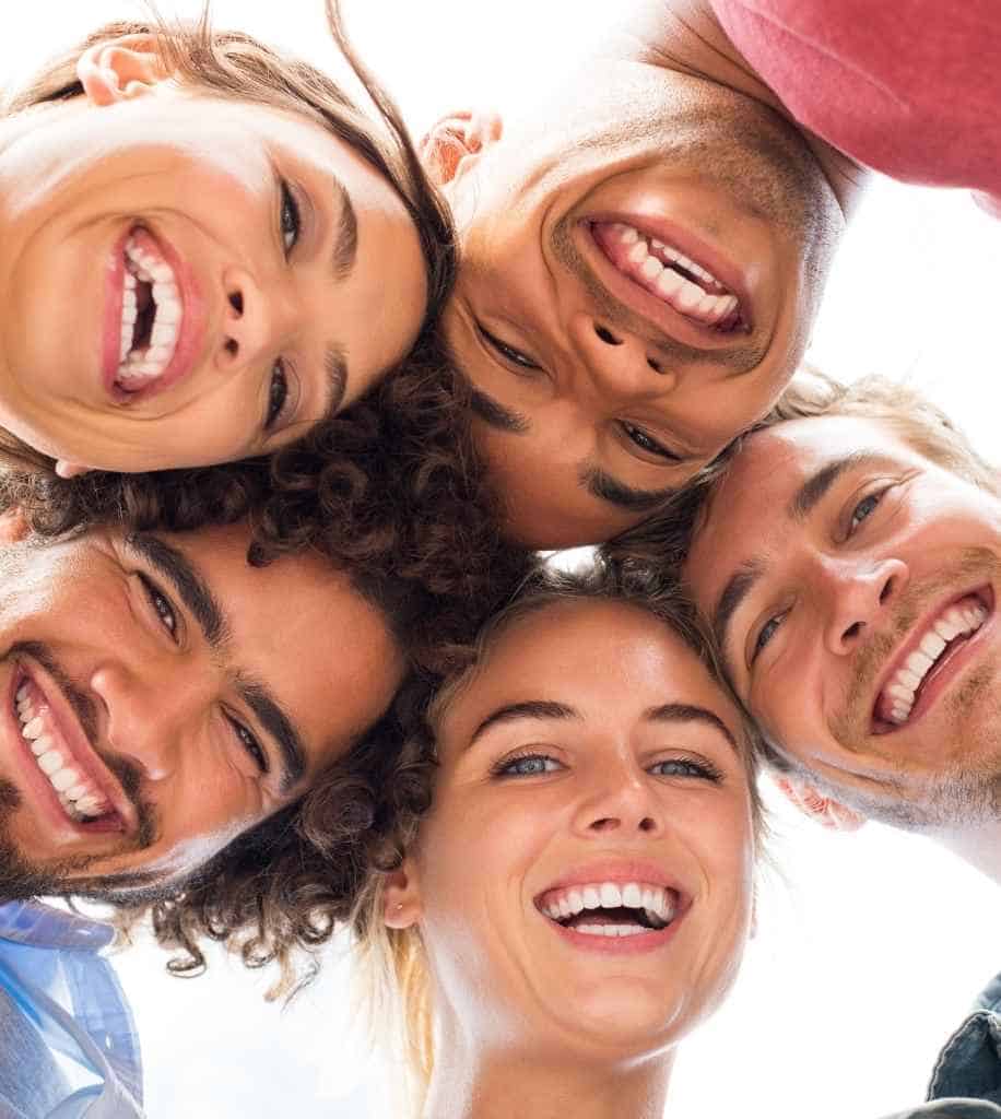 Smiling person showcasing white teeth after laser whitening treatment Newbury